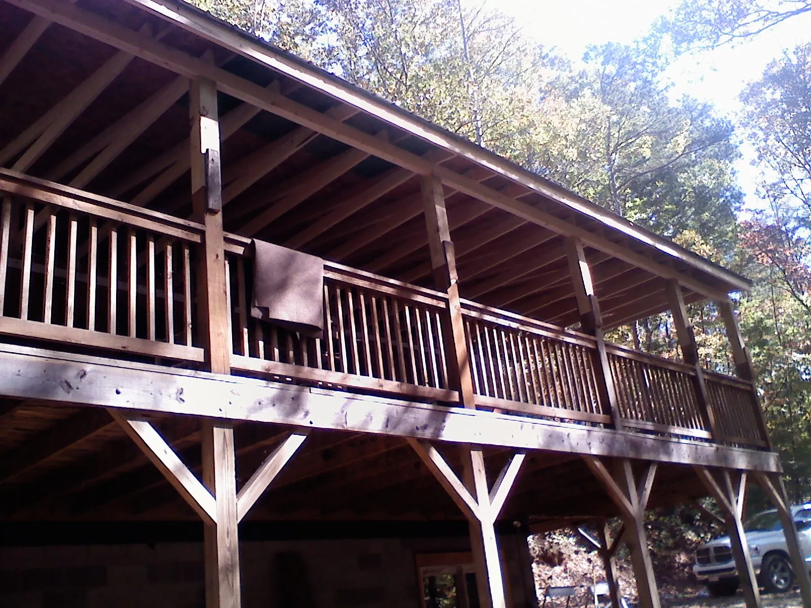 Timber framing under a new elevated porch and deck — Roof Leak Repair in Cummaquid by Roofing Brothers